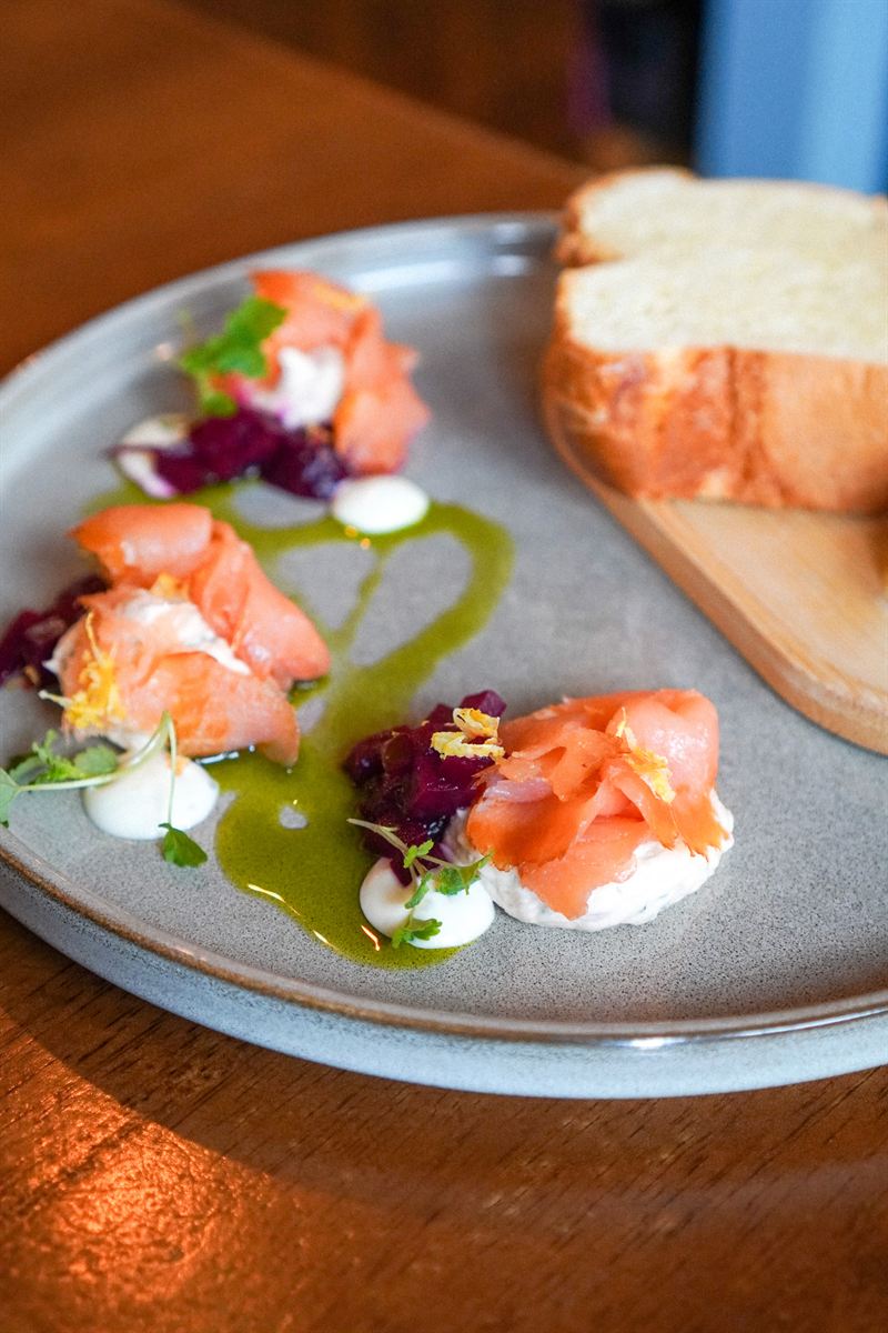 Smoked salmon starter with beetroot and crème fraîche on sourdough